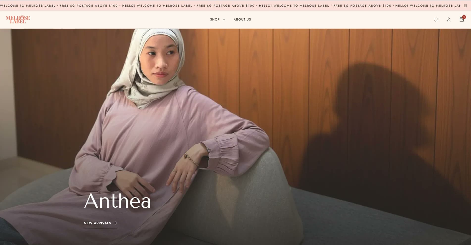 Melrose Label storefront home page: announcement bar with free Singapore postage, the Shop and About navigation, and a full-width photo of a model in a dusty-pink top with the Anthea New Arrivals link